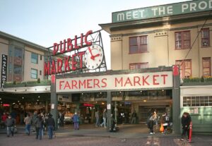 Pike Place Market sign and crowd in Seattle