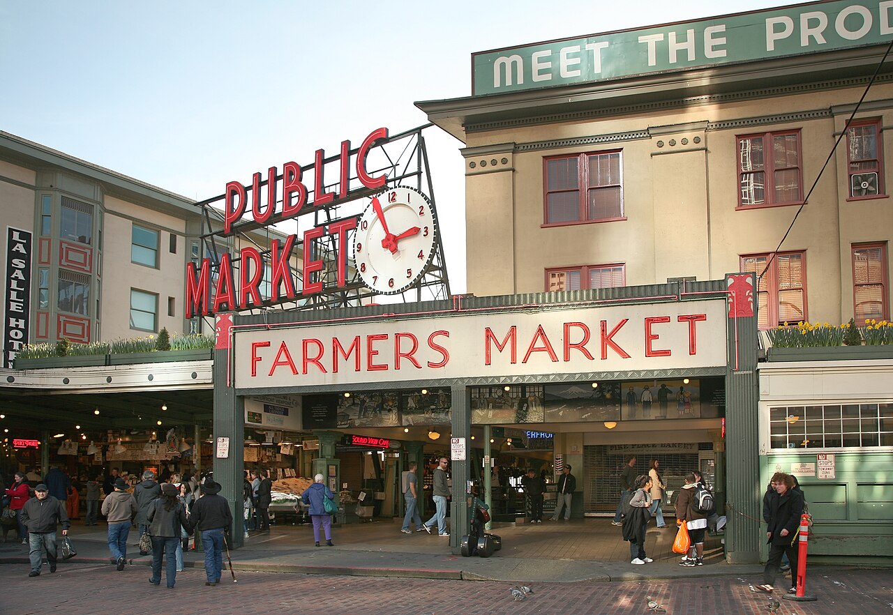 Pike Place Market sign and crowd in Seattle